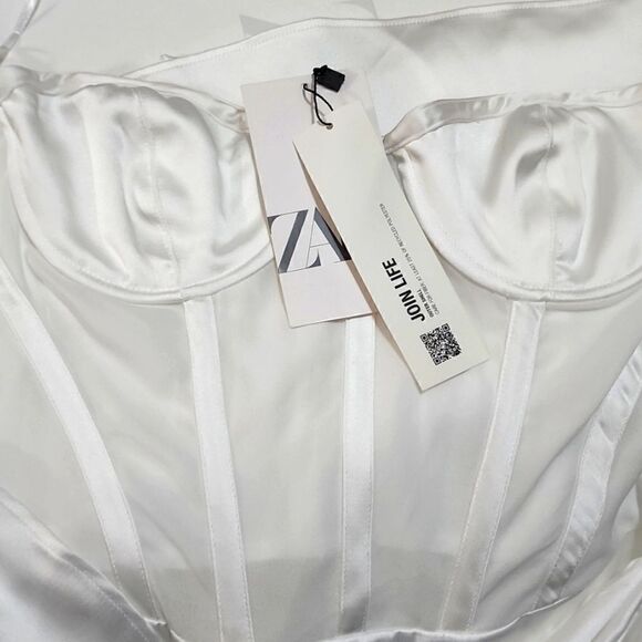 STRAIGHT NECK UNDERWIRE MINI DRESS. FRONT WRAP DETAIL WITH RUCHING. SIDE HIDDEN - Picture 9 of 10